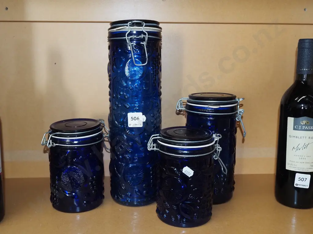4x blue embossed glass storage canisters Tallest H330 Image 1++