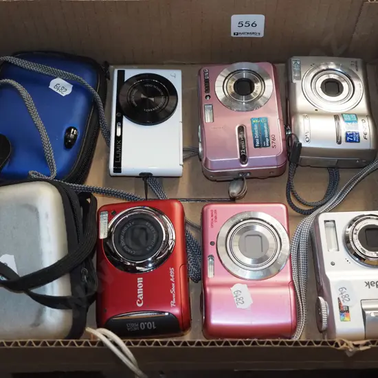box; 6 digital cameras