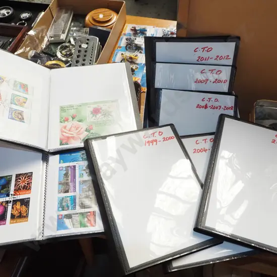 box; various stamps in plastic folders