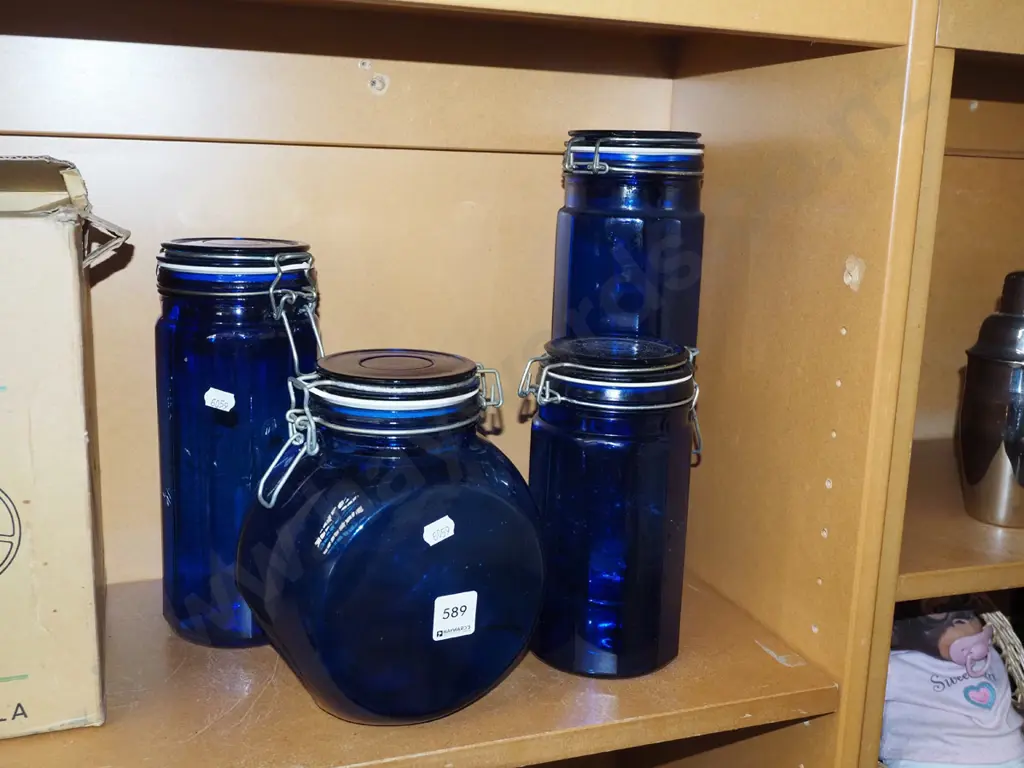 4x self sealing blue glass storage canisters Image 1++