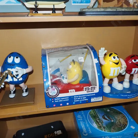 shelf; M&M promotional toys