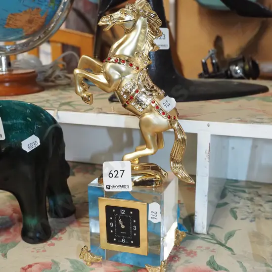 crystal mantle clock with rearing horse figurine on top - horse is loose