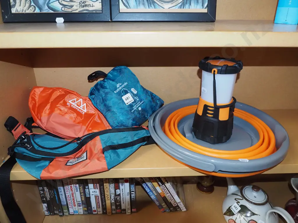 shelf; camping lanterns, collapsable bucket, backpack rain cover etc Image 1++