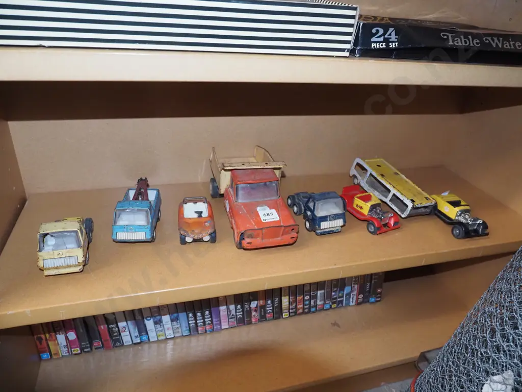 shelf of toy vehicles Image 1++