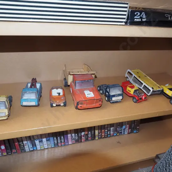 shelf of toy vehicles