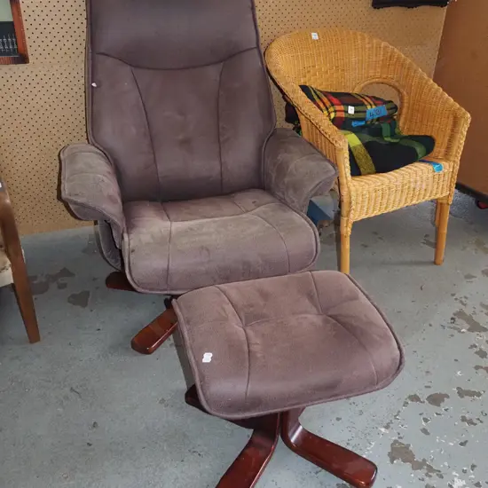 brown faux leather swivel reclining armchair with matching footstool