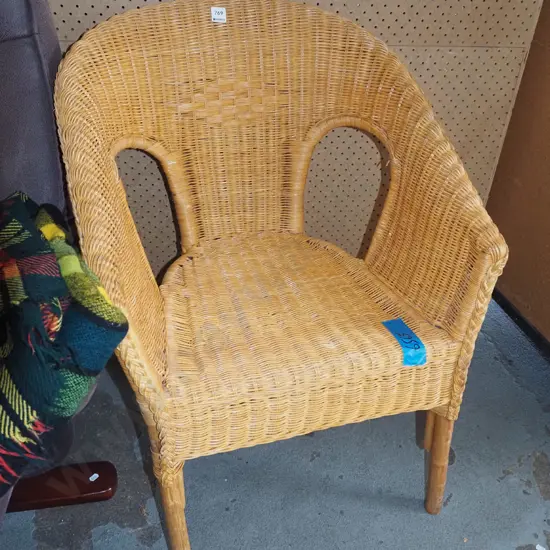 woven cane armchair