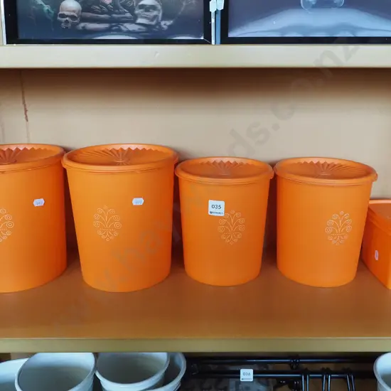 shelf of vintage Tupperware storage containers