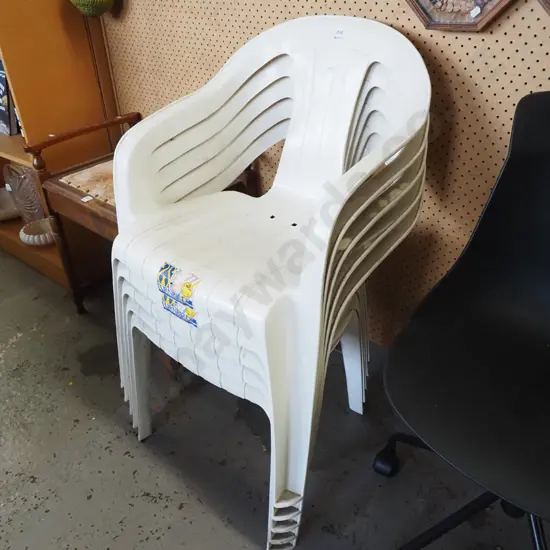 5x white plastic stacker chairs