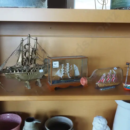 shelf of model ships