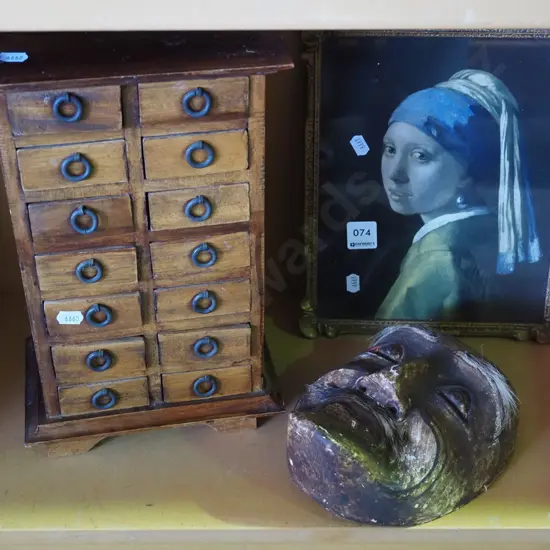 girl with pearl print, ethnic wooden mask - damage, small 14 drawer chest H320