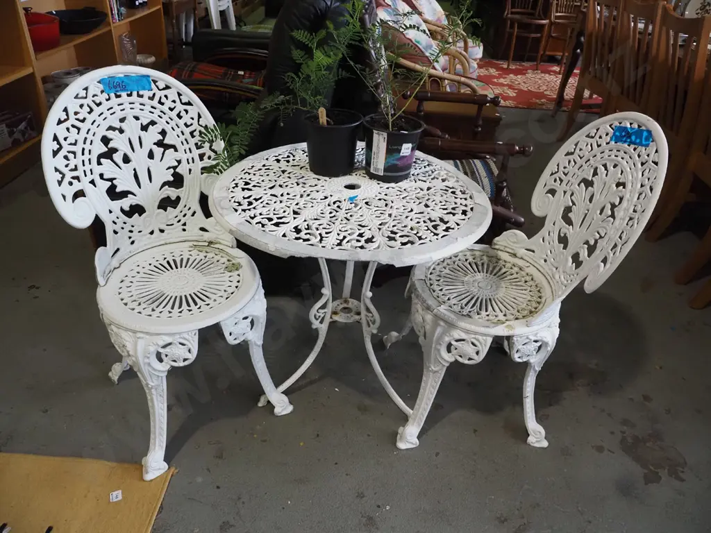 cast alloy patio table with 2 chairs - paint needs attention, chips to rim of table Image 1++