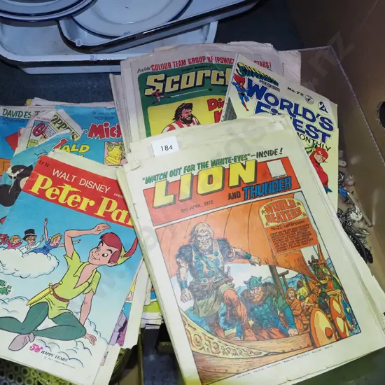 satck of various comic books/graphic novels