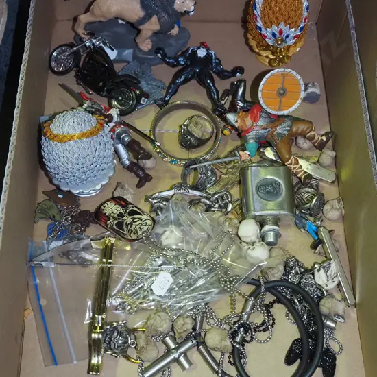 box; figurines, fantasy swords, plastic skulls etc
