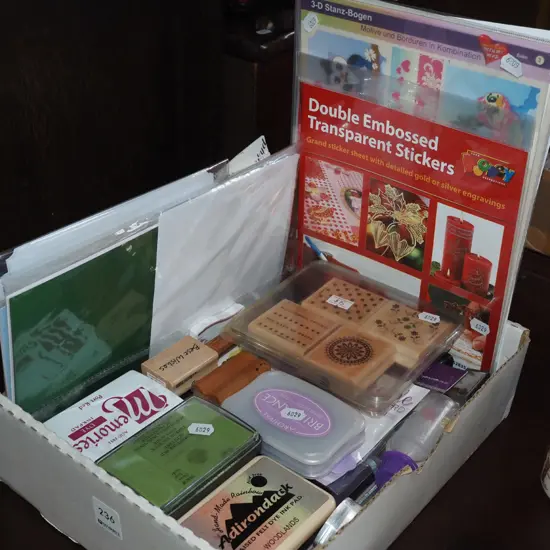 box of crafting supplies, stamps, cards, stickers etc