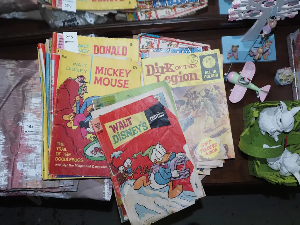 stack of comics Image 1++