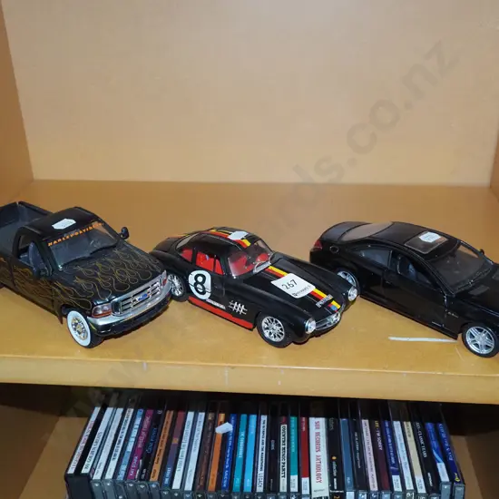 3x diecast model vehicles