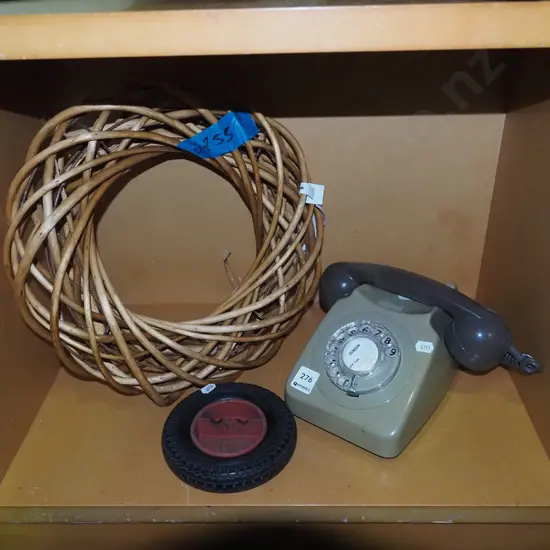 cane wreath, dial telephone, tyre themed ashtray