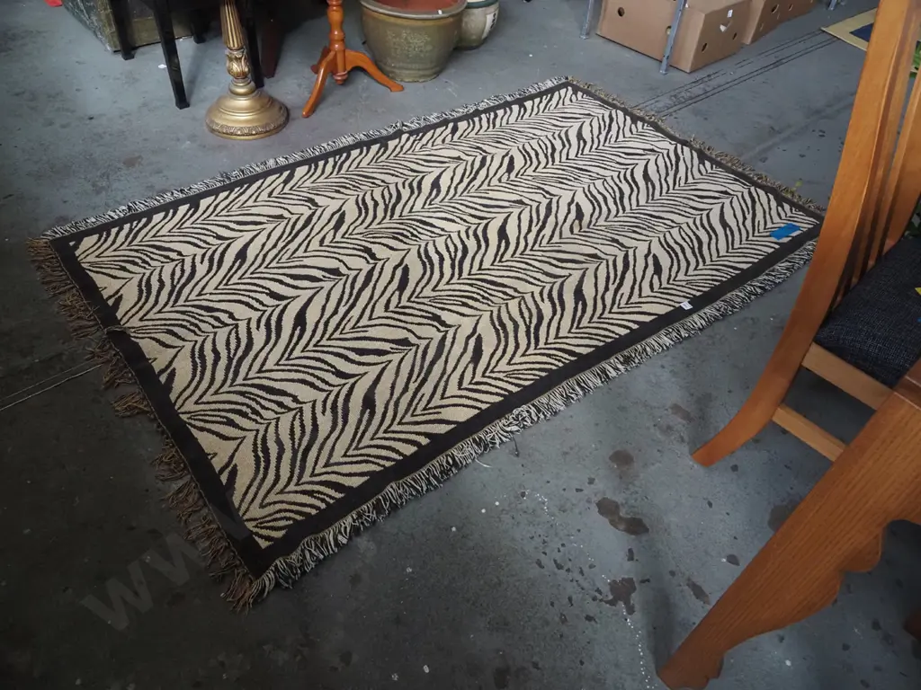 light weight black and fawn striped tasselled edge woven floor mat L1930 W1140 Image 1++