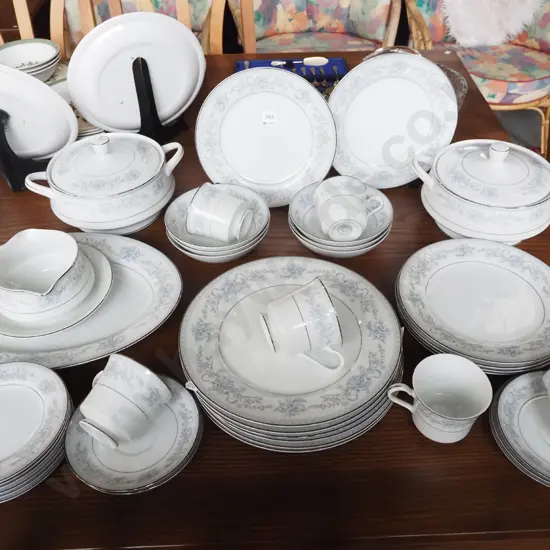 large assortment of Mikasa blue floral white and silver rim dinner items; plates, ashets etc
