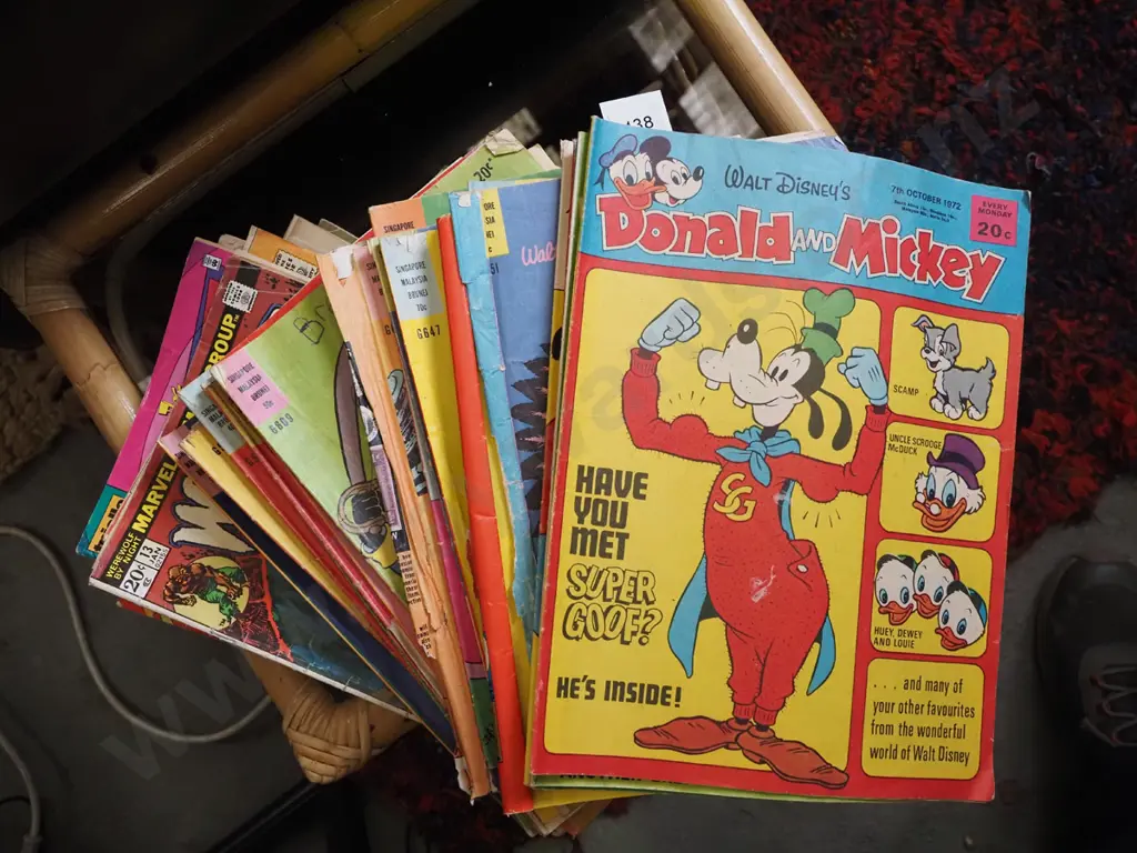 stack of comic books Image 1++