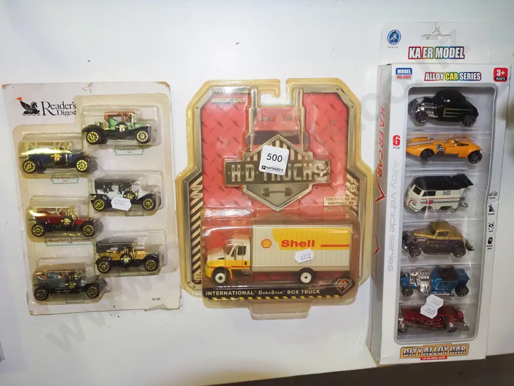 3x boxes of model vehicles Image 1++