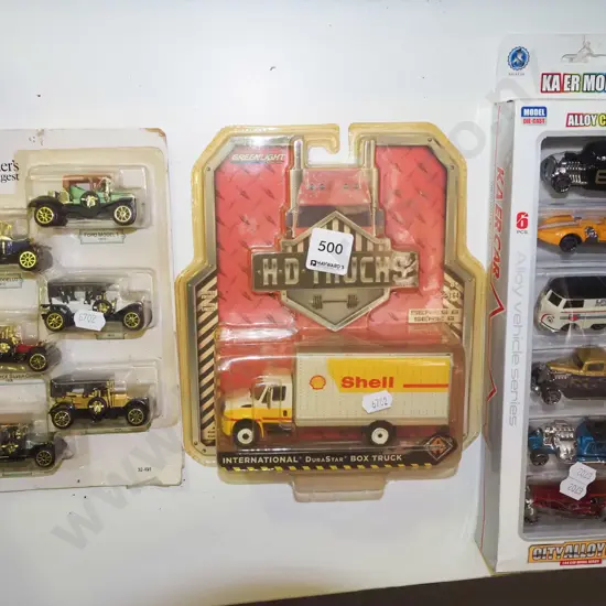 3x boxes of model vehicles