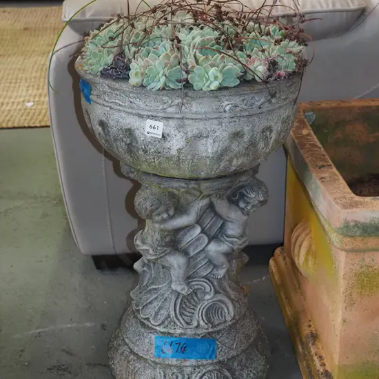 figural based garden planter and succulents H600