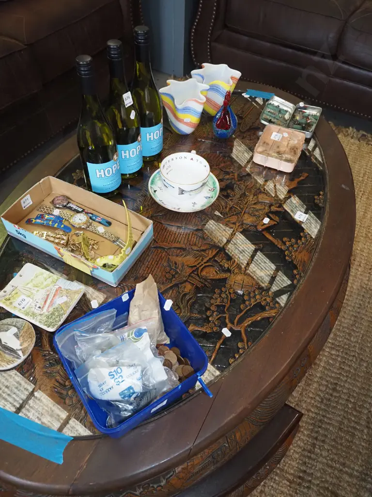 Chinese low oval dining table, heavily carved battle scene under glass with 6 matching pull out stools H500 W1250 D780 Image 1++