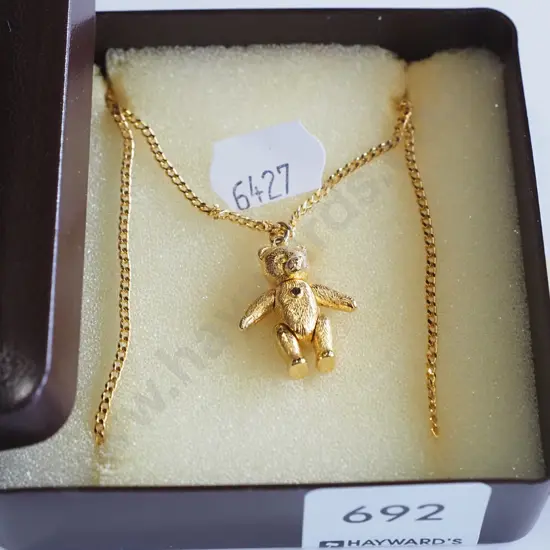 teddy bear pendant on chain
