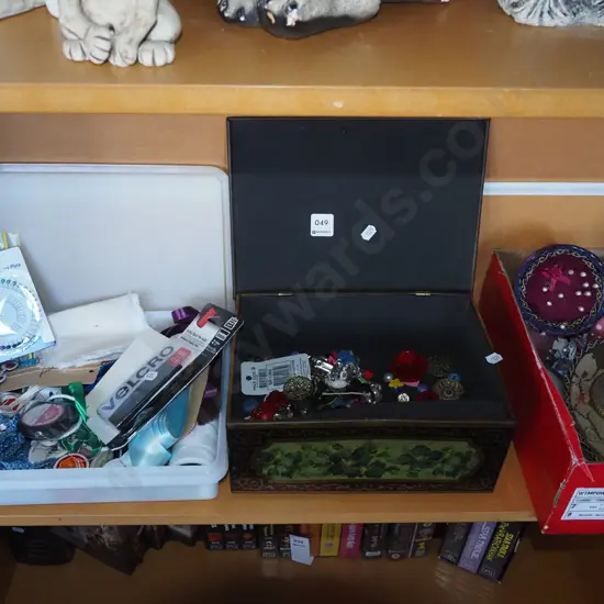 shelf; container of sewing supplies, buttons, pin cushions, pins