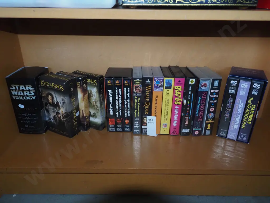 shelf of VHS tapes Image 1++