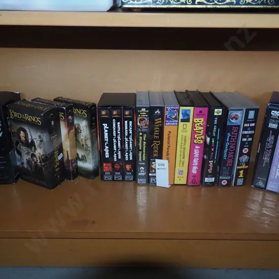 shelf of VHS tapes