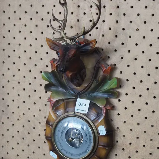 plastic and wood stag themed barometer