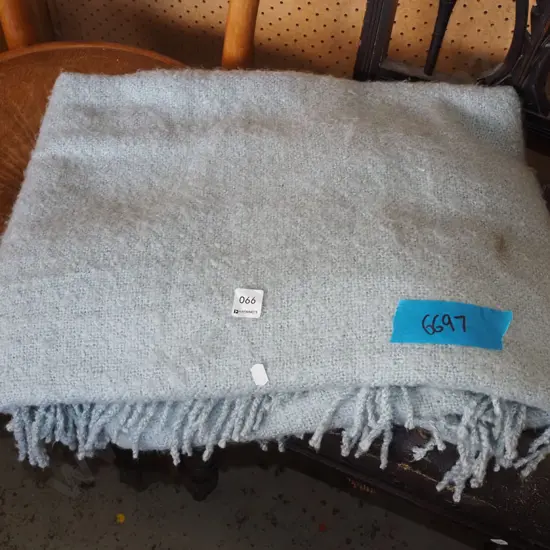 teal woollen blanket