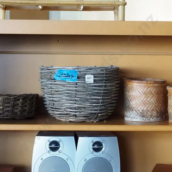 shelf of 4x cane baskets
