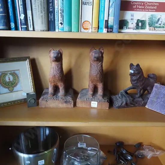 shelf; carved wooden dog figurines, framed mixed media, vespa case, autograph book