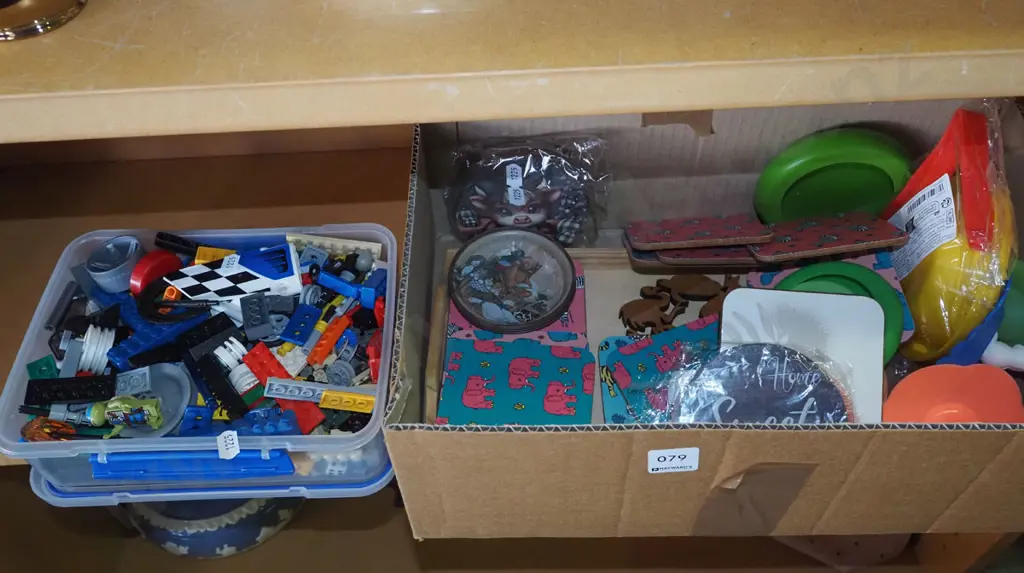 plastic container of Lego and a box of various coasters etc. Image 1++