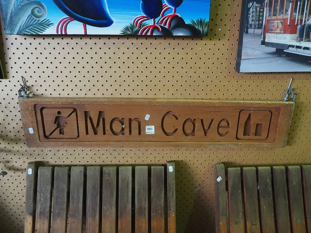 carved wooden man cave sign Image 1++