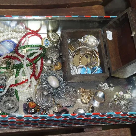 tin of costume jewellery, carved trinket box