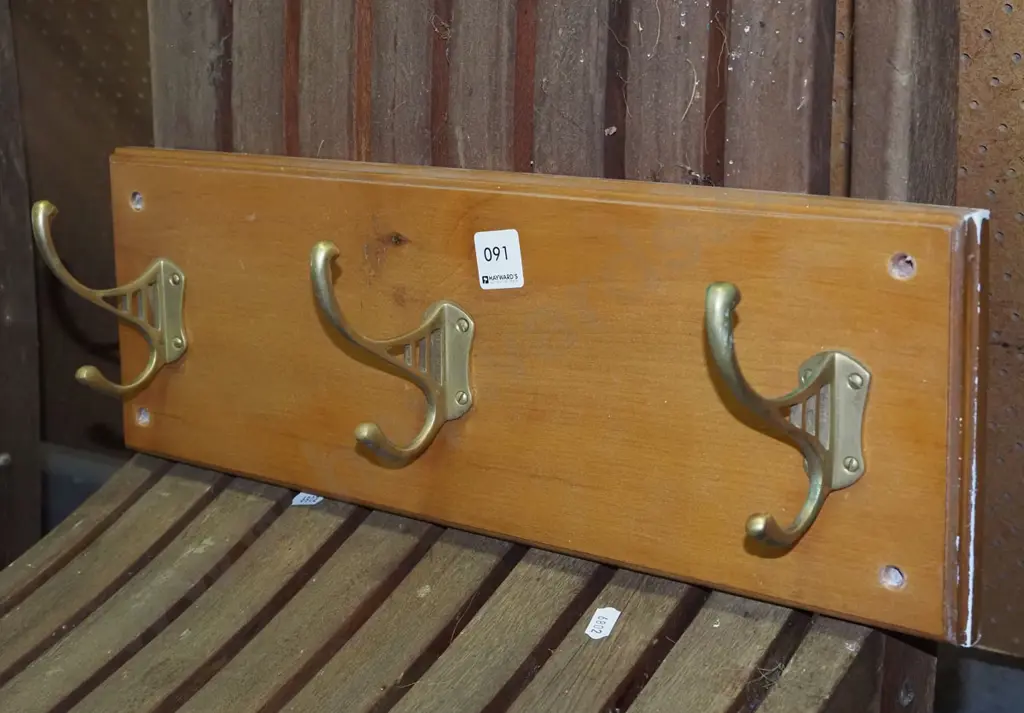 3x brass coat hooks on board Image 1++