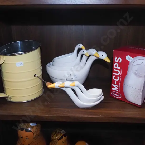 flour, goose themed measuring cup, spoons etc
