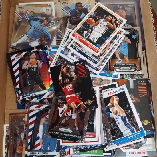 box of various sporting collector cards
