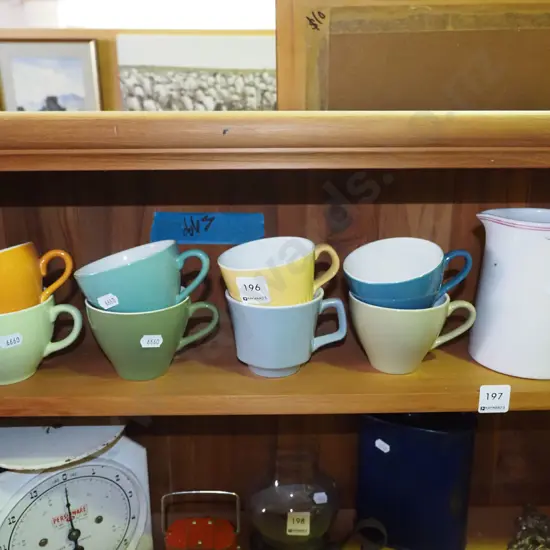 8x Crown Lynn cups, milk jug