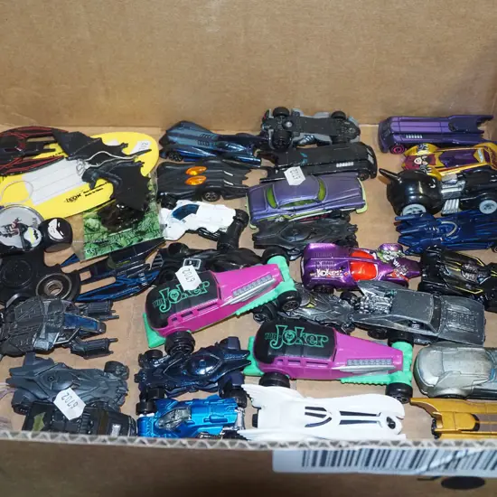 box of toy vehicles