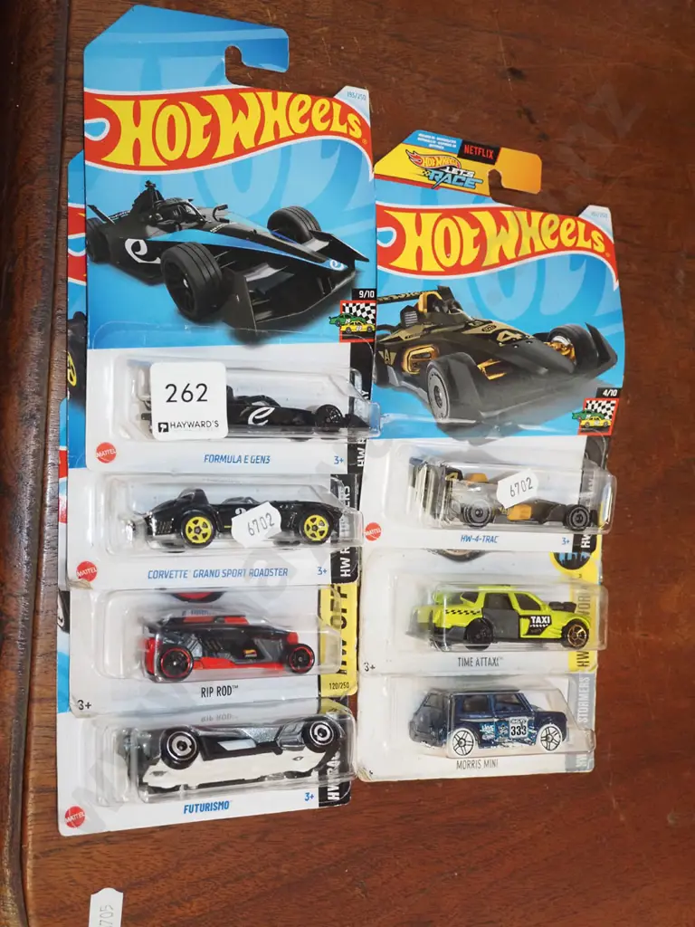 7x carded Hotwheels vehicles Image 1++