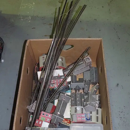 box; model train layout buildings, tracks