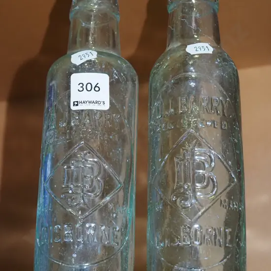 2x A.J. Barry marble bottles