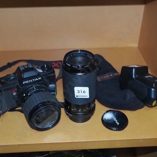 Pentax A3 35mm camera with additional lens and flash
