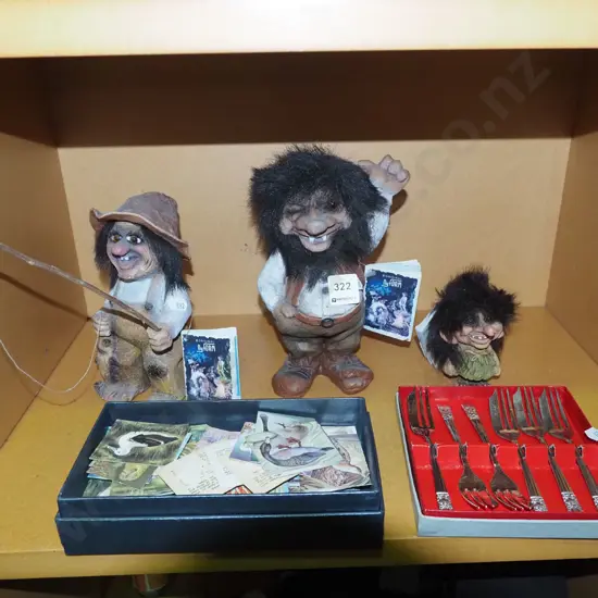 troll figurines, cake forks, collector cards